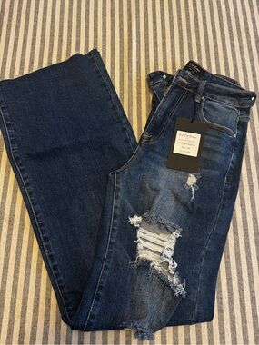 Women's Dark Blue Distressed Boot Cut Jeans by Risen